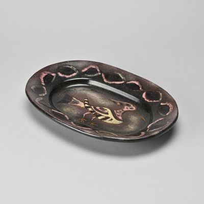 a close up of a plate with a design on it
