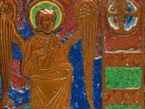 an image of a painting of an angel on a plaque