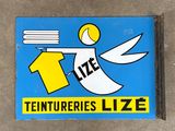 a blue sign with a picture of a man holding a tennis ball