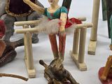 many figurines that are sitting on a table