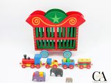 a small toy train with many different toys in it