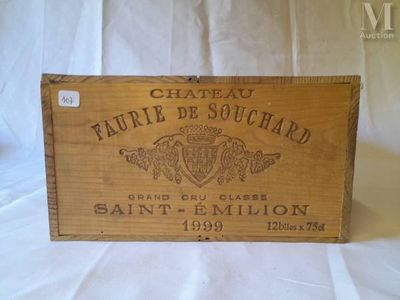 an old wooden box with a label on it sitting on a white cloth