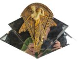 a mirror with a picture of an angel on it