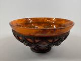 an image of a brown bowl sitting on top of a white table