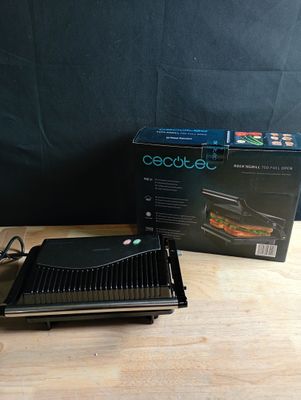 a box of food sitting on a table next to a toaster