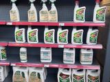 many bottles of cleaning products on the shelves in the store