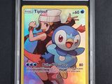 the pokemon trading card is in a plastic holder on a table