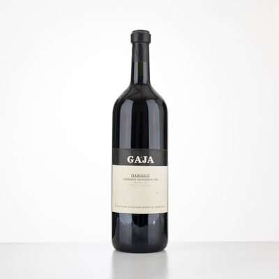 a close up of a bottle of wine on a table