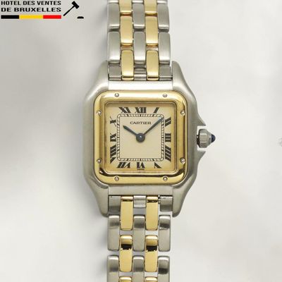 an image of a wrist watch with roman numerals on it