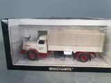 toy truck in a box with a tag on the side of it