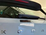 a close up of a car ' s rear window with a sticker on it