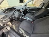 the interior of a car with a steering wheel and a dashboard