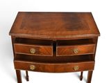 an image of a small wooden table with two drawers