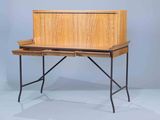 a small wooden desk with a drawer on top of it