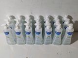six flacons de gel hydroalcoolique sont alignés sur un comptoir