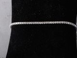 a close up of a bracelet on a mannequin