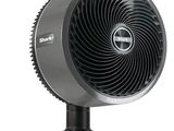 a close up of a fan on a stand on a white background