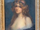 portrait of a woman in a blue dress with a pink flower in her hair