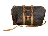 louis vuitton monogram canvas and leather duffle bag