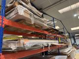 many pallets of wood on the shelves in the warehouse