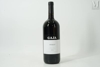 a bottle of wine that is sitting on a table