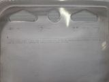 a picture of a metal tray with some buttons on it