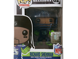 Figurine Funko Pop en vinyle représentant un joueur de football, dans sa boîte