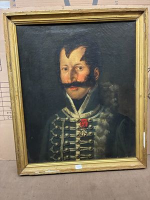 tableau représentant un homme avec une moustache et une barbe, dans un cadre doré