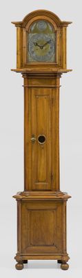 a wooden grandfather clock that is on display on a white background