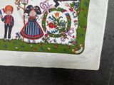 a white bag with a picture of a couple on it