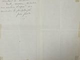 a piece of paper with writing on it and a pen on it