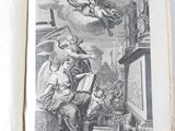 an old book with a picture of an angel on it