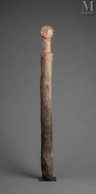 an image of a wooden stick with a face on it