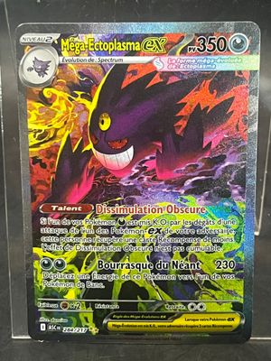 a close up of a pokemon card on a table