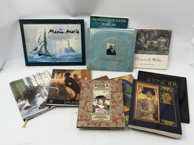 several books sitting on a white surface with a white background