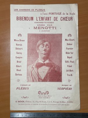 une affiche représentant un homme en costume