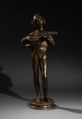 a bronze statue of a woman holding a mandolin