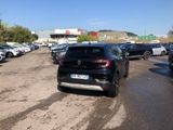 a lot of cars parked in a parking lot