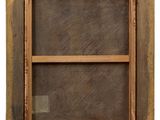 a close up of a wooden frame with a window in it
