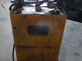 a small machine that is sitting in a garage