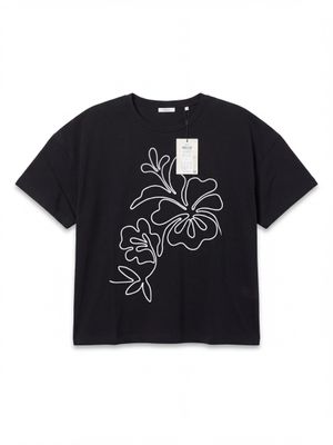 a black t - shirt with white flowers on it