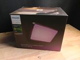 packaging for a philips smart speaker with a pink box