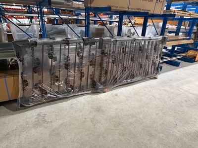 a large amount of items in the warehouse on the shelves