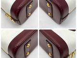 four pictures of a white and maroon bag with gold handles