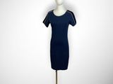 a mannequin with a black hat and a blue dress