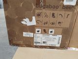 a large cardboard box sitting on top of a carton