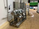a picture of a machine that is sitting in a warehouse