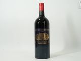 a bottle of wine that is sitting on a table