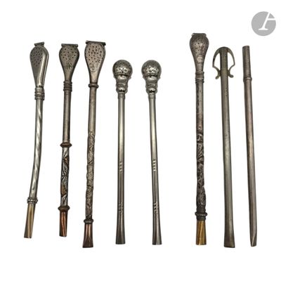 four different types of metal walking canes on a white background