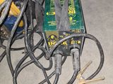 a lot of wires and tools on the floor
